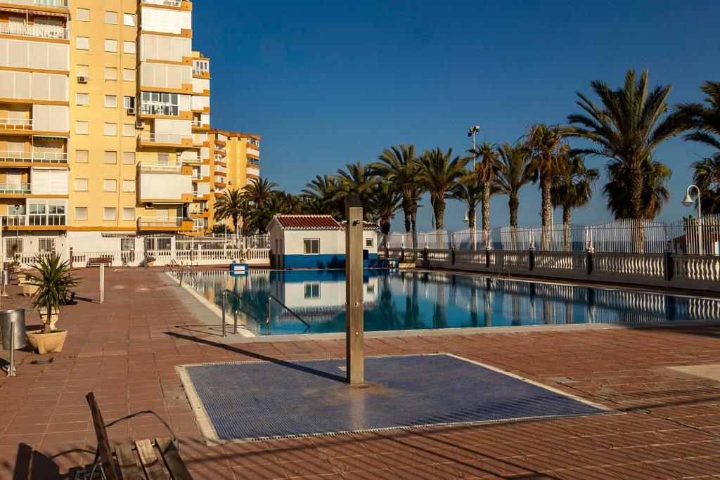 Bazén v ubytovaní Primera Línea de Playa alebo v jeho blízkosti