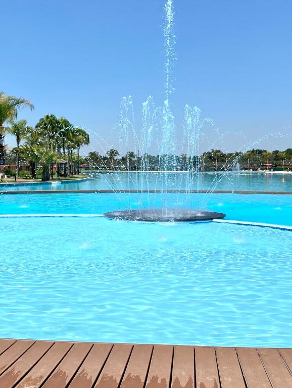 a fountain in the middle of a pool of water at The Blyde 104 in Pretoria