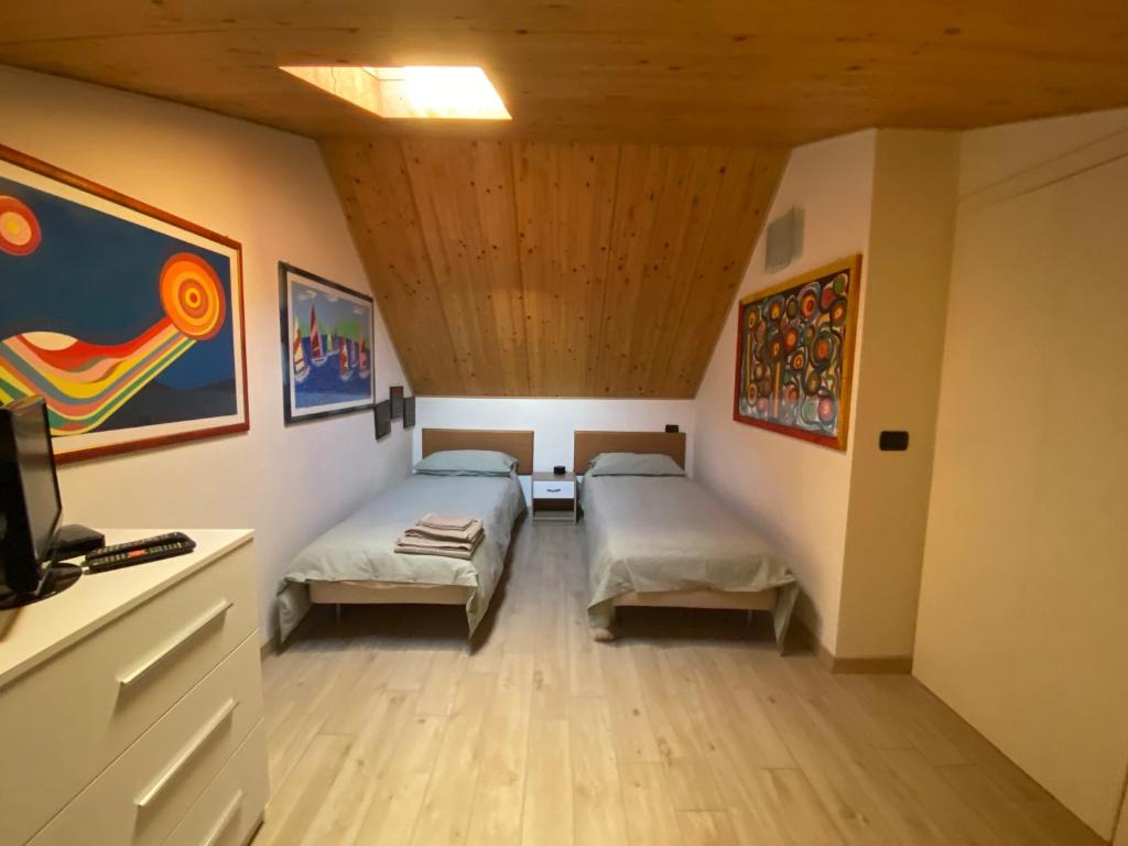 Posteľ alebo postele v izbe v ubytovaní Bellavista Giulia on Lake Como