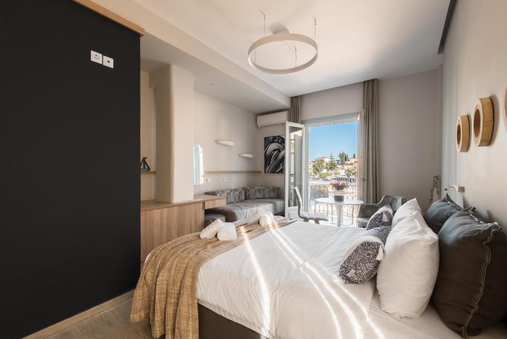 Klimis Hotel - Habitación Triple Con Vista Al Mar Parcial