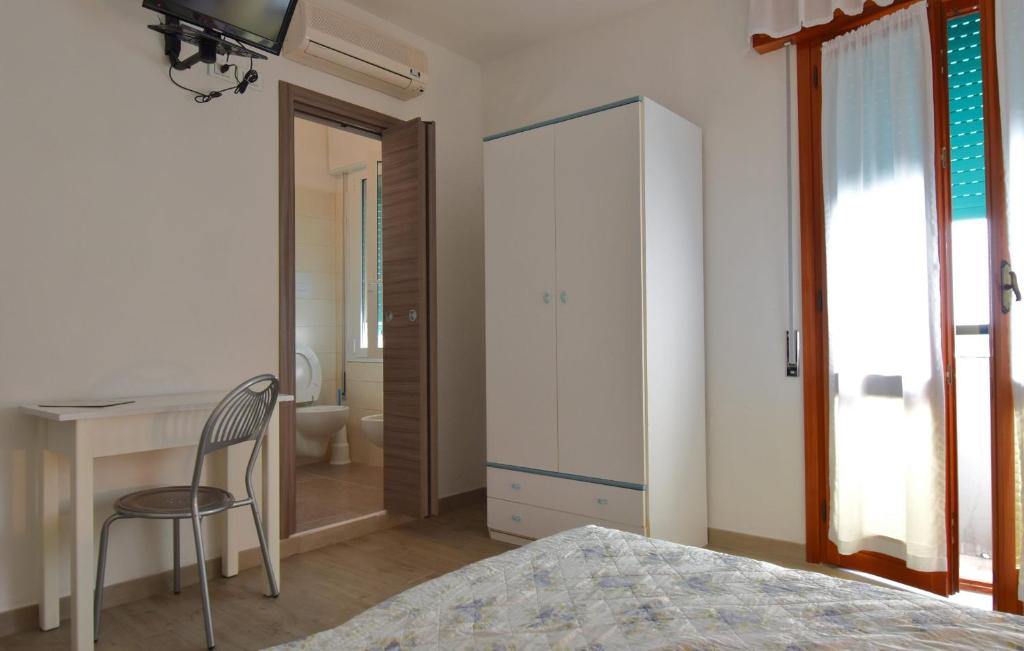 Postel nebo postele na pokoji v ubytování Hotel Zanin