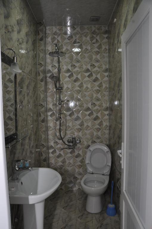 Koupelna v ubytování hotel Vaxx