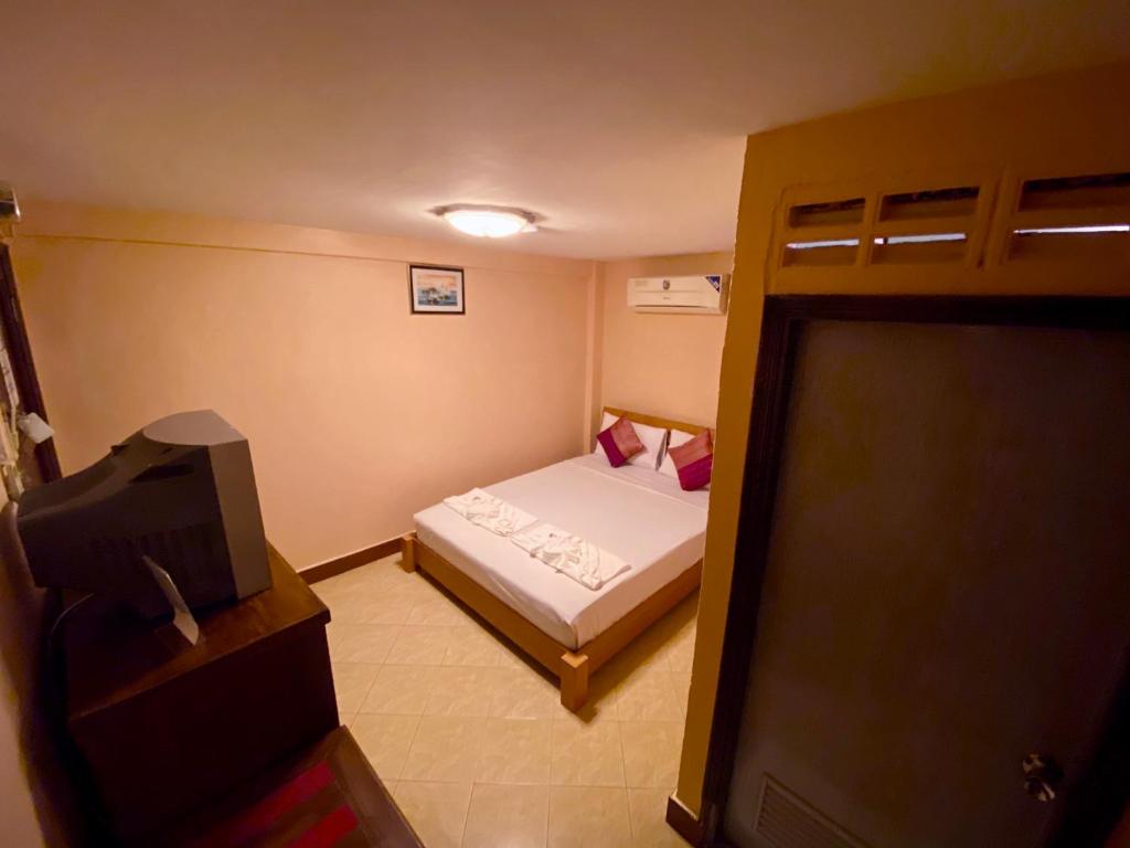 Postel nebo postele na pokoji v ubytování Star Guesthouse