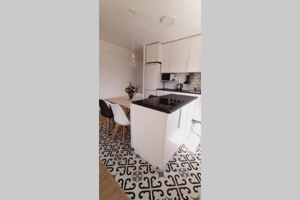 Kuchyň nebo kuchyňský kout v ubytování Acogedor y luminoso apartamento con vistas al mar