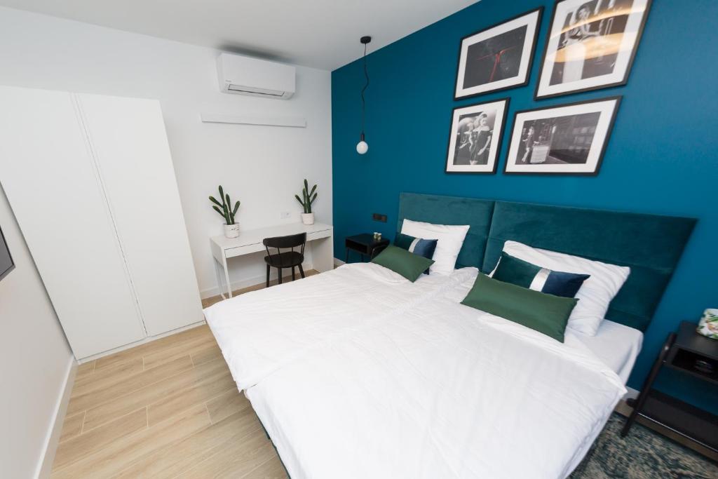 Posteľ alebo postele v izbe v ubytovaní Apartament Kołobrzeg Quattro