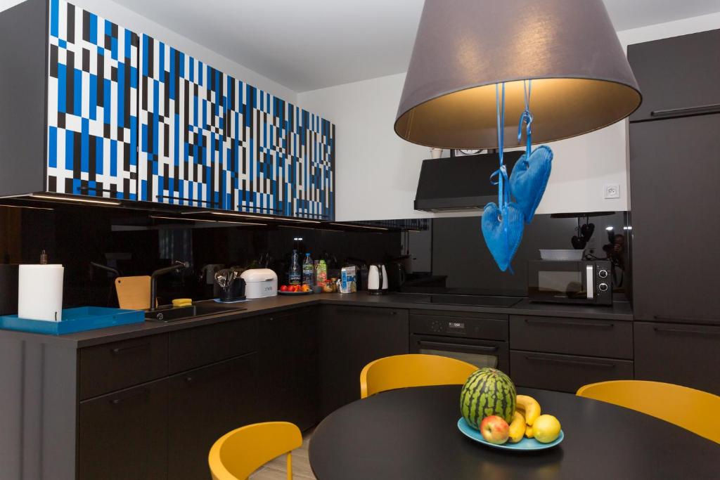 Kuchyňa alebo kuchynka v ubytovaní Apartament Kołobrzeg Quattro