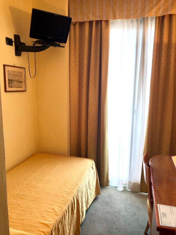 TV a/nebo společenská místnost v ubytování Hotel San Clemente
