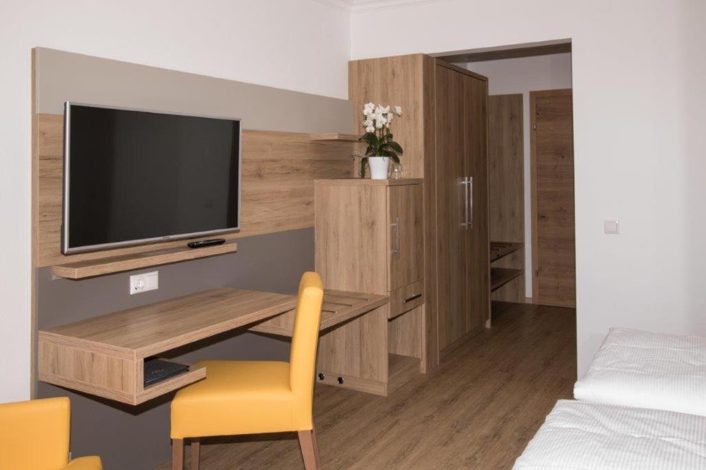TV a/nebo společenská místnost v ubytování Ferienhotel Hofer superior