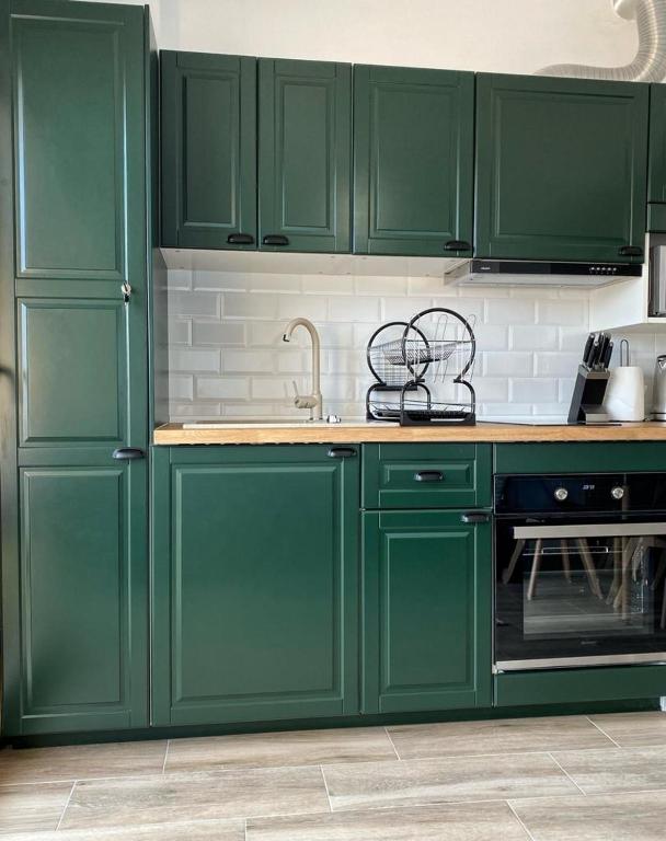 Kuchyň nebo kuchyňský kout v ubytování Apartamenty Toledo