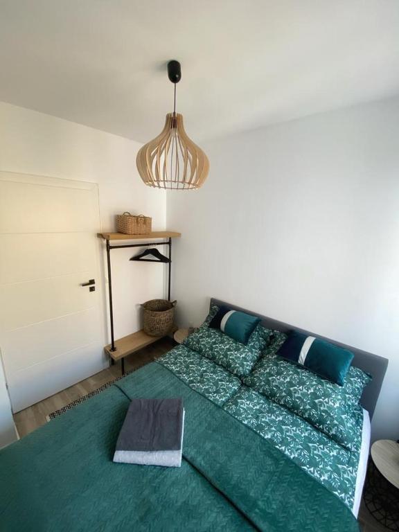 Postel nebo postele na pokoji v ubytování Apartamenty Toledo