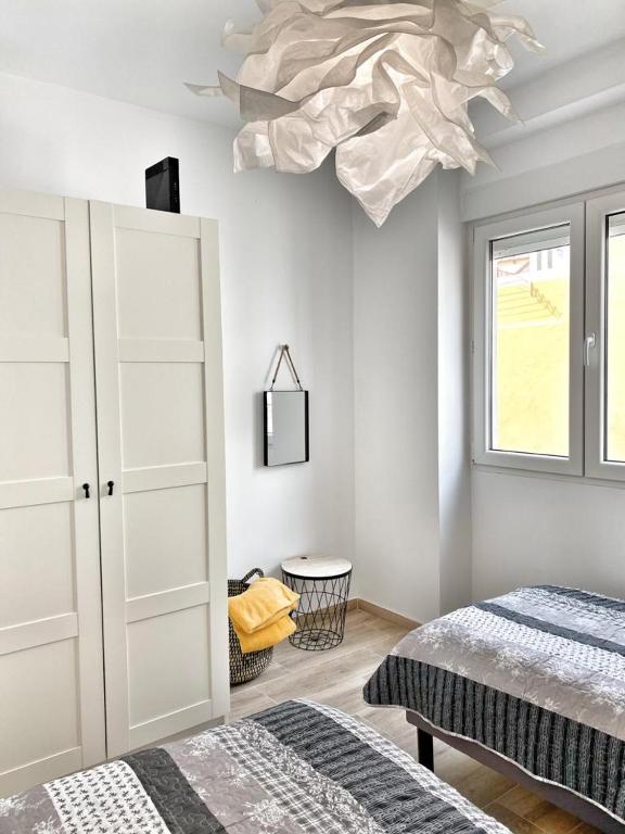 Postel nebo postele na pokoji v ubytování Apartamenty Toledo