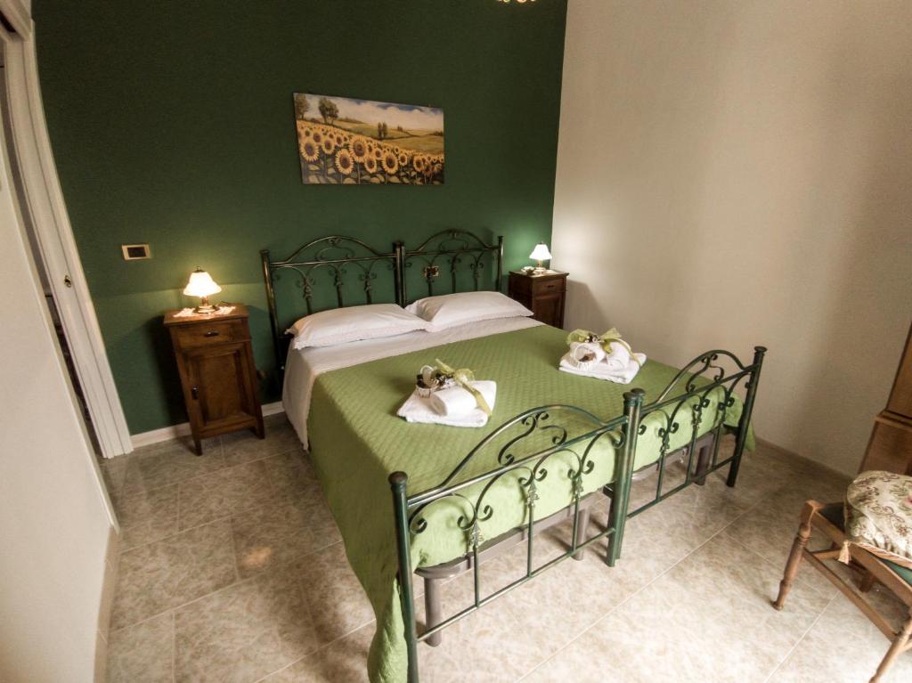 Postel nebo postele na pokoji v ubytování B&B Rosy Gallo