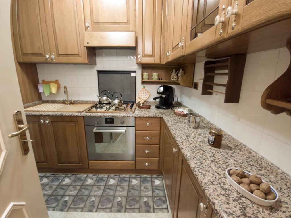 Kuchyň nebo kuchyňský kout v ubytování B&B Rosy Gallo