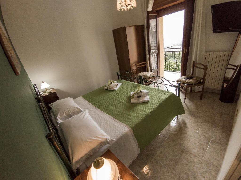 Postel nebo postele na pokoji v ubytování B&B Rosy Gallo