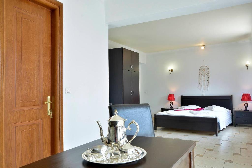 Postel nebo postele na pokoji v ubytování Golden fox Villa