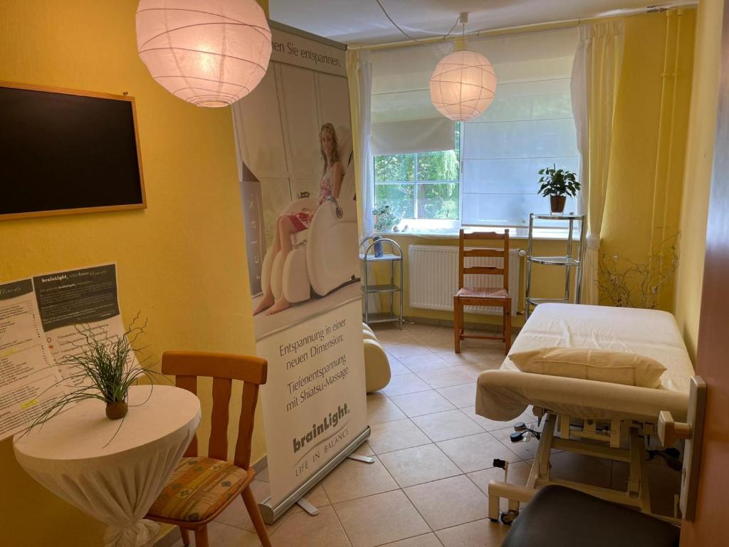 TV a/nebo společenská místnost v ubytování Waldhotel Harz Ilsenburg