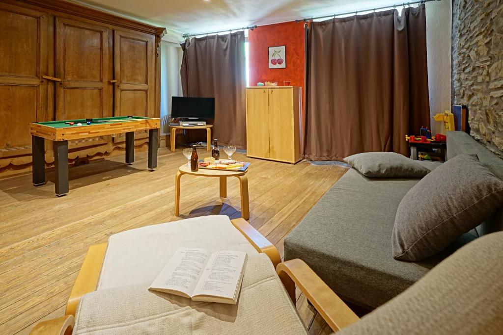 Posezení v ubytování Le Clos Arboré (Gîte)