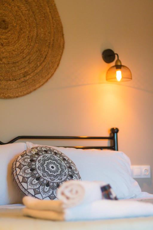 A bed or beds in a room at Elysian Studios