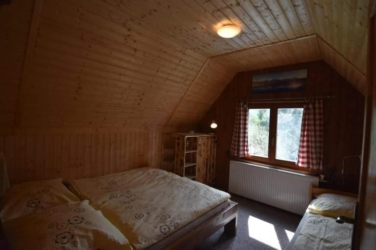 Postel nebo postele na pokoji v ubytování Chata Daniela