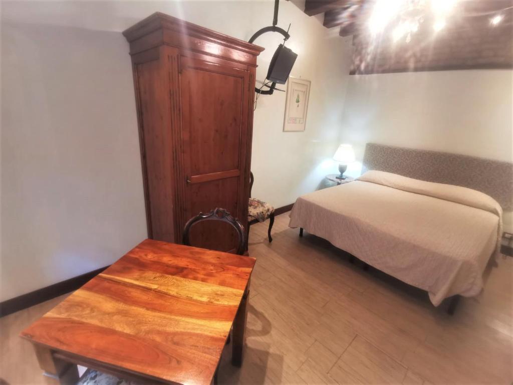 Posteľ alebo postele v izbe v ubytovaní Canal View Studio Flat