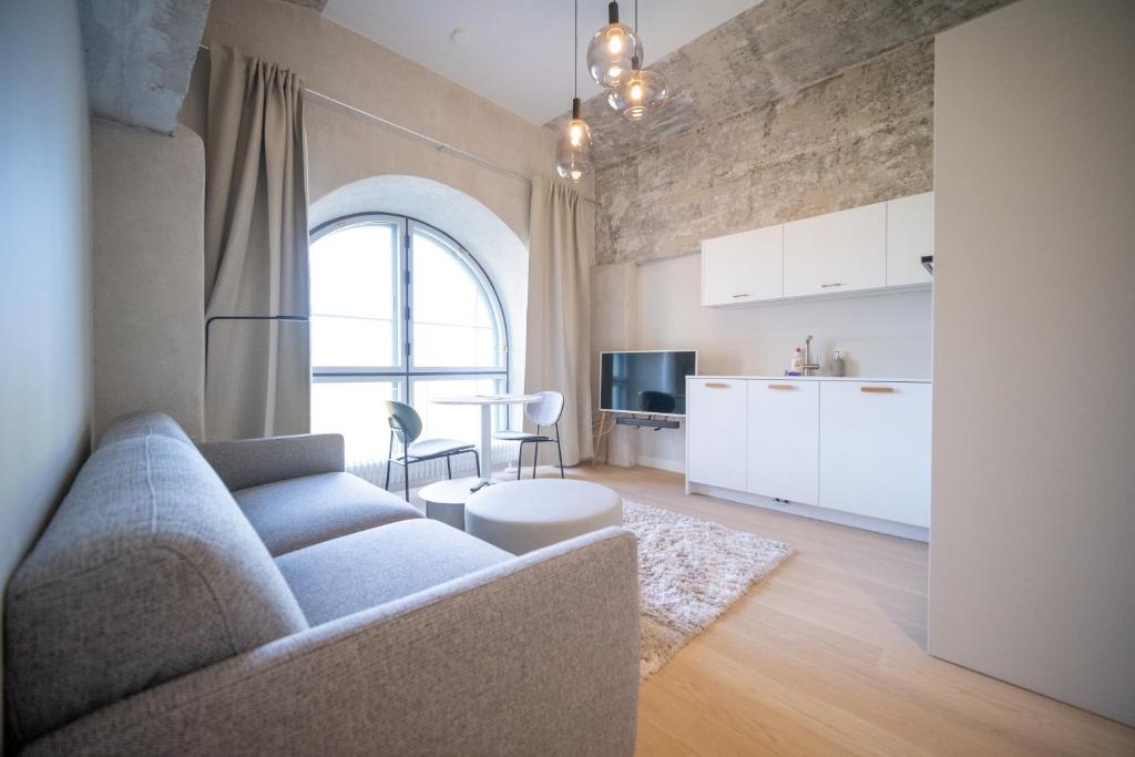 Posezení v ubytování Baltic Accommodation - Urban Style Apartment