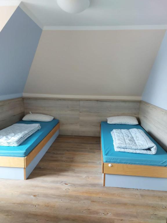 Postel nebo postele na pokoji v ubytování Haus Klaarstrand