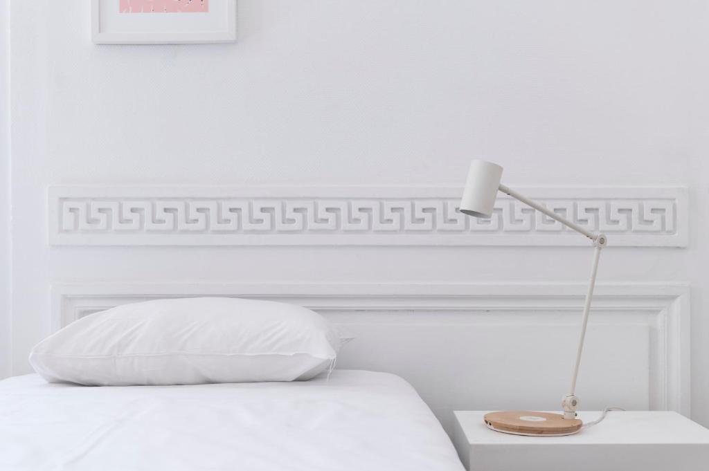 Postel nebo postele na pokoji v ubytování SLO Hostel Lyon les Pentes