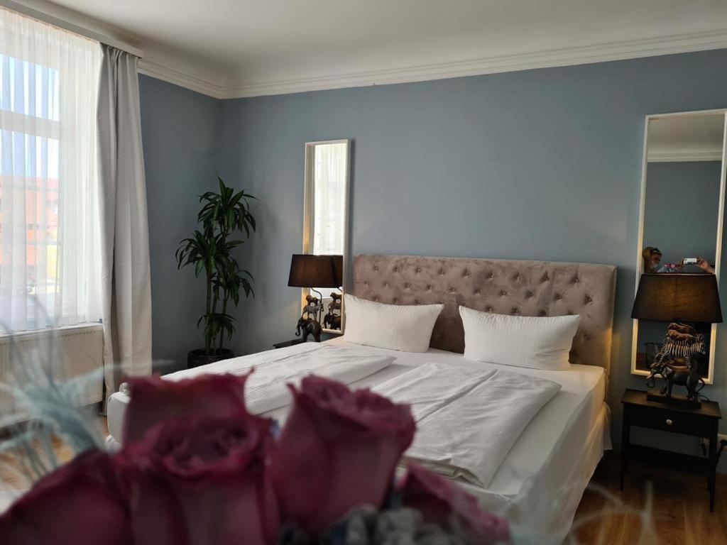 Postel nebo postele na pokoji v ubytování Altstadthotel Molitor