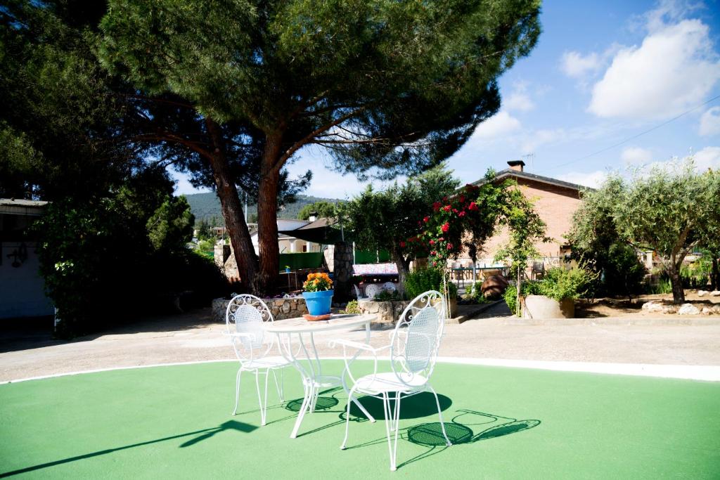 Piscina en o cerca de Casa de campo en pelayos