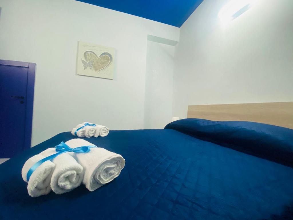 Posteľ alebo postele v izbe v ubytovaní Tremiti Home