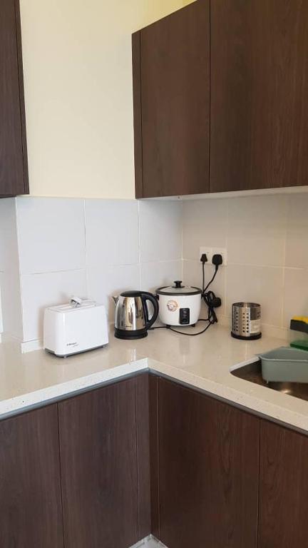 Kuchyň nebo kuchyňský kout v ubytování Aleeya Suite @ Troika Residence