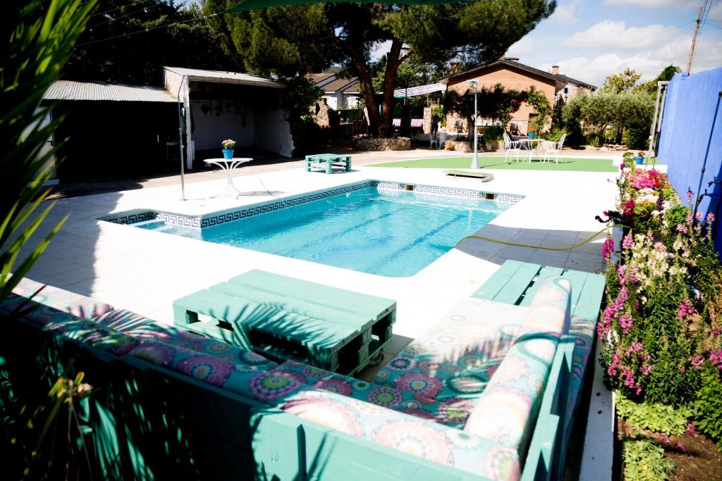 Piscina en o cerca de Casa de campo en pelayos