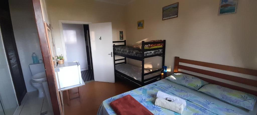  ALOHA em frente a praia- Suítes privativas & hostel