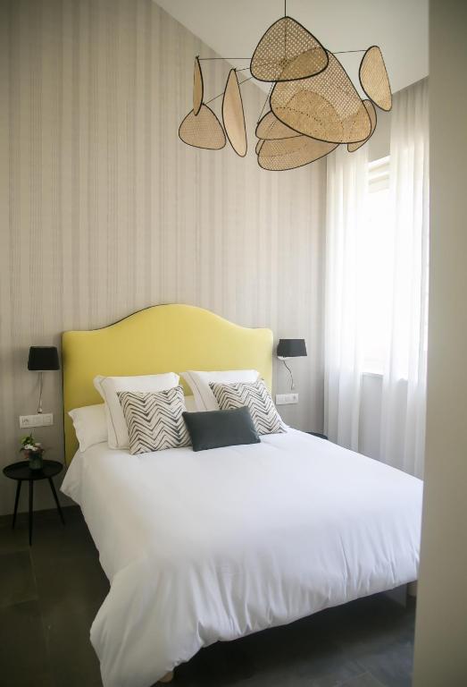 Posteľ alebo postele v izbe v ubytovaní Casa Chinitas Holiday Homes