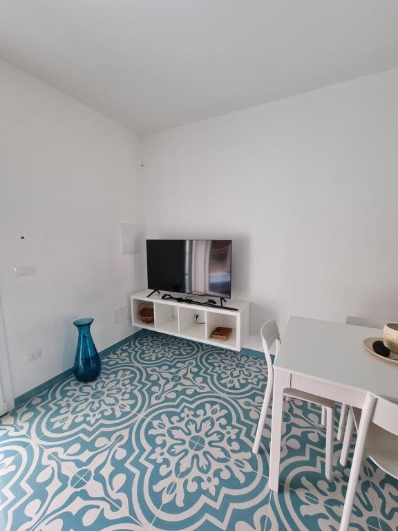 TV a/nebo společenská místnost v ubytování Pali's Rooms & Lodges