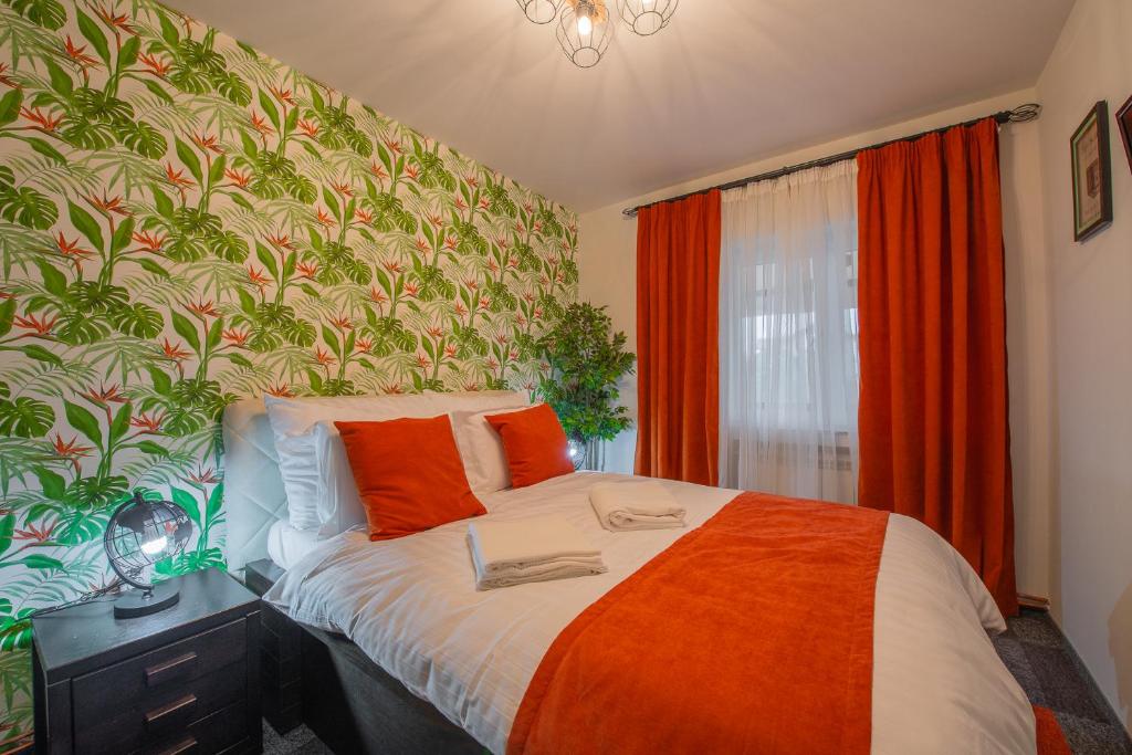 Postel nebo postele na pokoji v ubytování Apartmani Maximilian