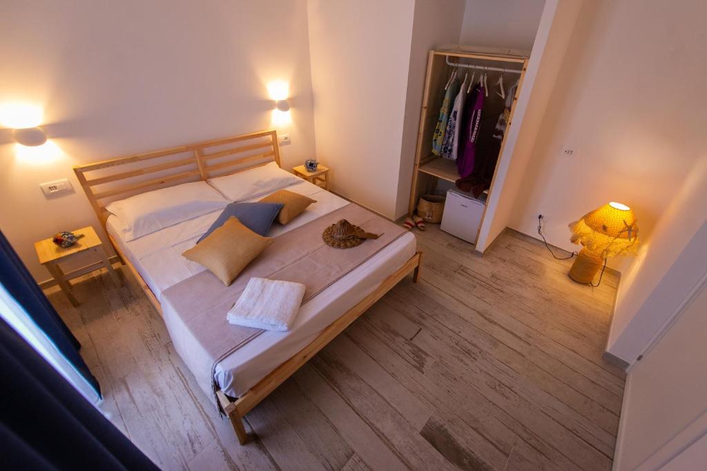 Postel nebo postele na pokoji v ubytování TiPino