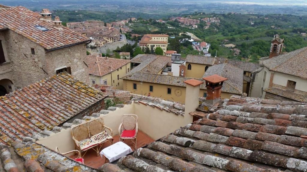 an aerial view of a town with roofs at The Roof House in Montepulciano