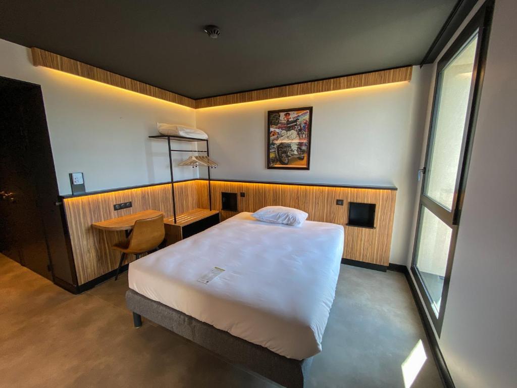 Postel nebo postele na pokoji v ubytování B&B HOTEL Clermont-Ferrand A71-A75 La Méridienne