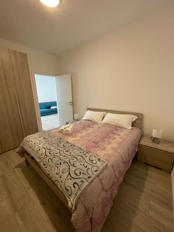 Posteľ alebo postele v izbe v ubytovaní Residenza Gasparoni di Guidi Eleonora