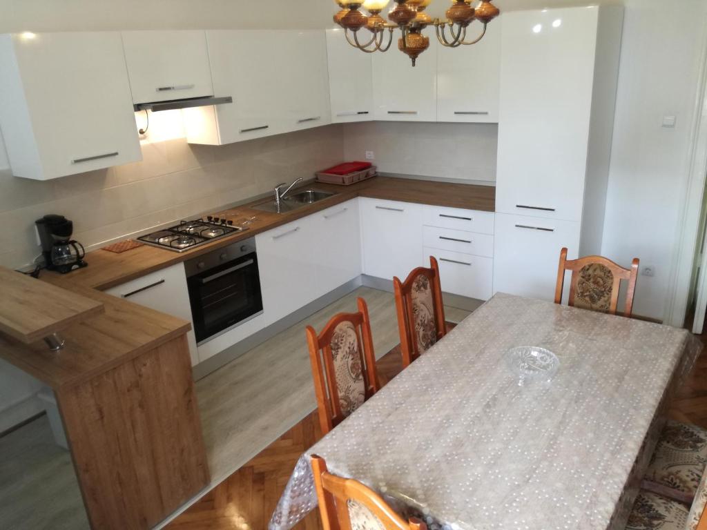 Kuchyň nebo kuchyňský kout v ubytování Villa Paula