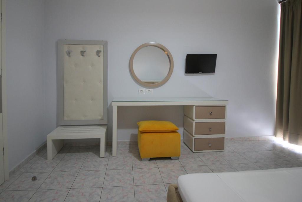 Postel nebo postele na pokoji v ubytování Murati Suites Sarandë