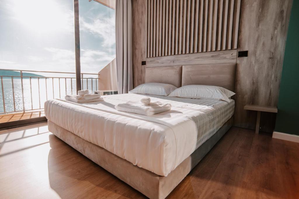 Postel nebo postele na pokoji v ubytování Inn Hotel
