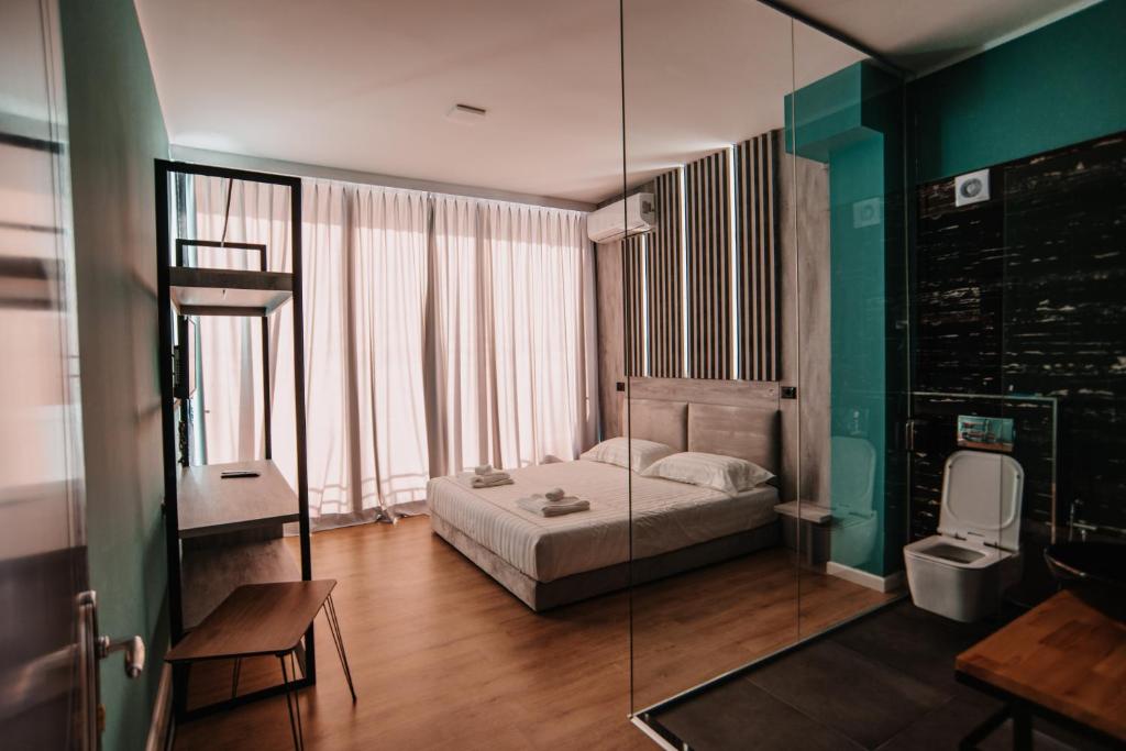 Postel nebo postele na pokoji v ubytování Inn Hotel