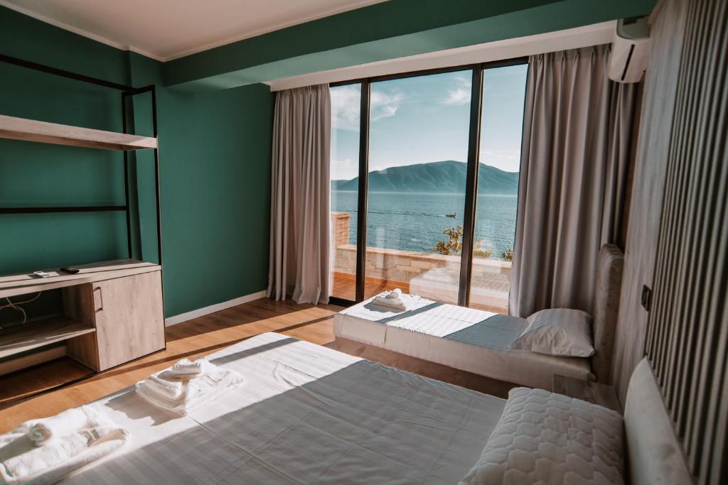 Postel nebo postele na pokoji v ubytování Inn Hotel