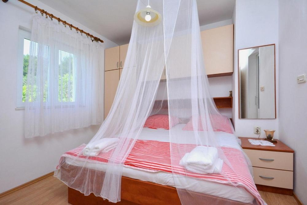 Posteľ alebo postele v izbe v ubytovaní Apartment with large terrace 3558-4