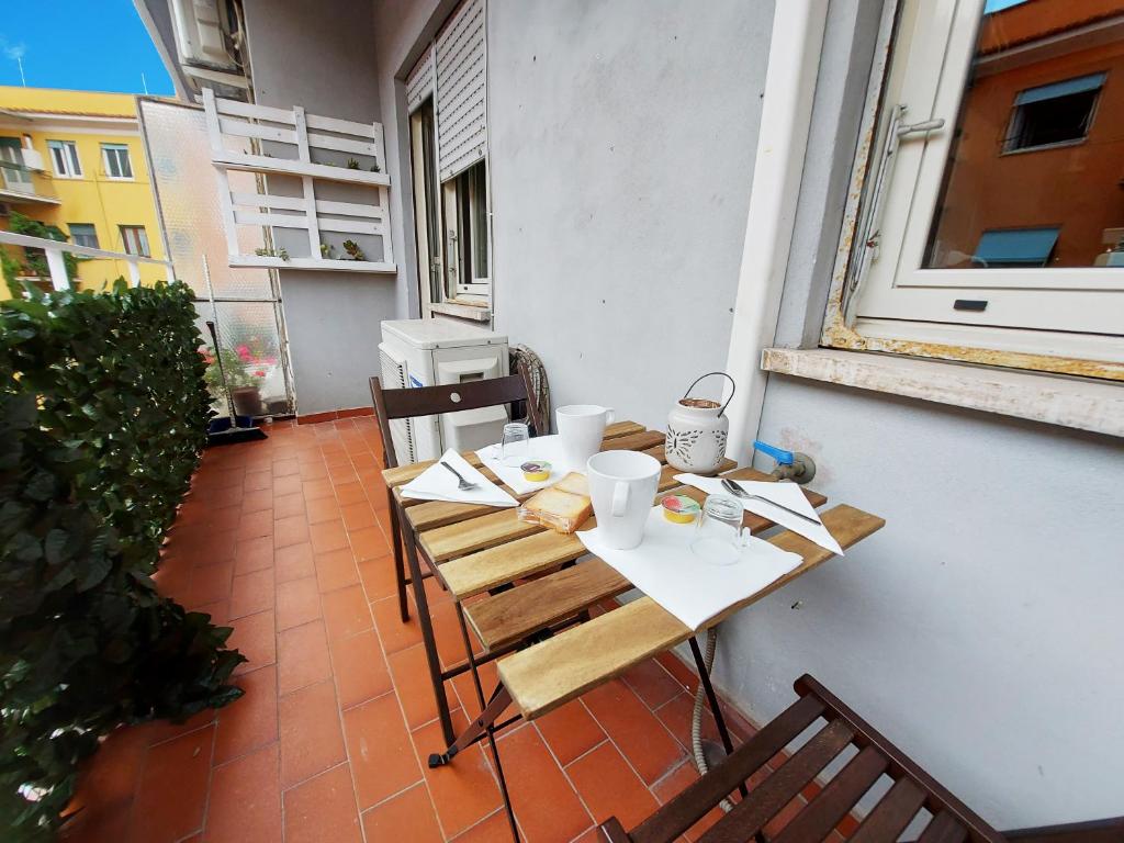 A balcony or terrace at FREE BREAKFAST - Michelangelo Dream House