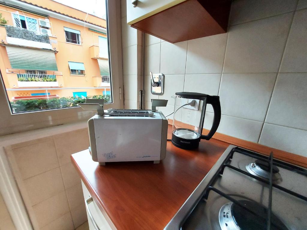 A kitchen or kitchenette at FREE BREAKFAST - Michelangelo Dream House