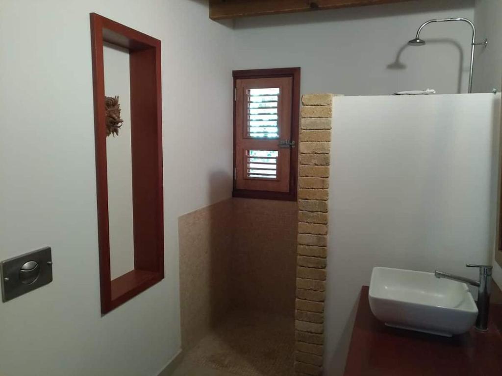 Koupelna v ubytování Un cosy sous le vent