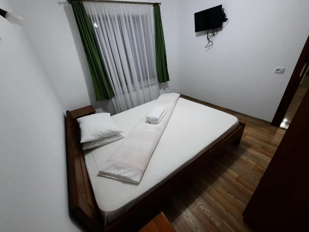 Postel nebo postele na pokoji v ubytování Vila Aloman